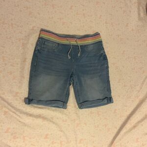 Girls shorts s 12, waist band on top with many colors and plain blue on bottom